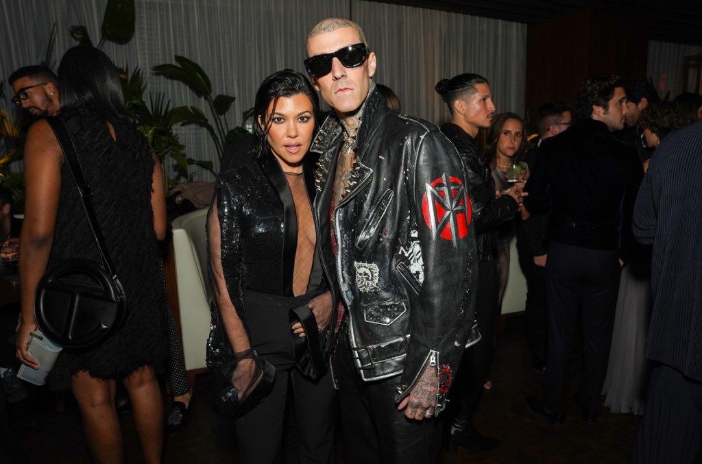 travis-barker-&-kourtney-kardashian-look-positively-spooky-in-beetlejuice-&-lydia-halloween costumes