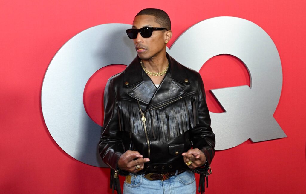 pharrell-williams-heckled-by-animal-protesters,-offers-them-a-hug