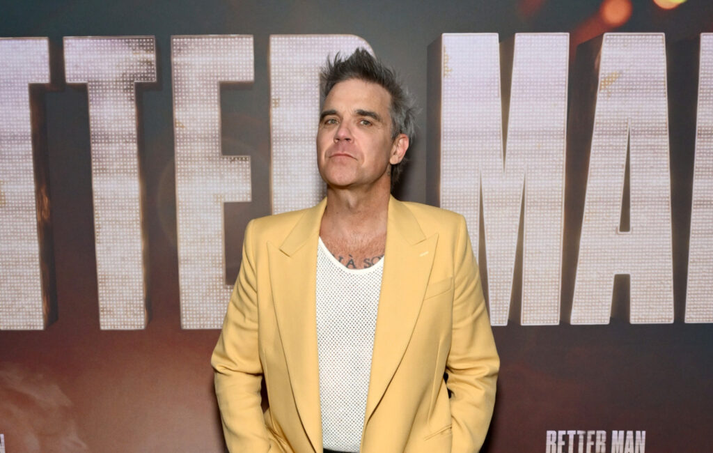 robbie-williams-on-why-he’s-played-by-a-cgi-monkey-in-new-biopic-‘better-man’