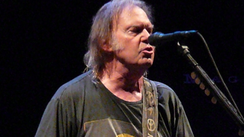 neil-young-drops-out-of-glastonbury,-calls-it-a-‘corporate-turn-off’